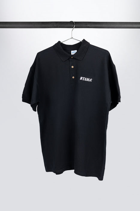 Tama polo in black with logo on left chest